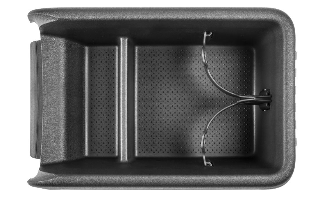 Storage compartment behind centre console