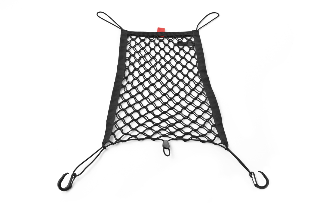 Dvojitá síť mezi přední sedadla